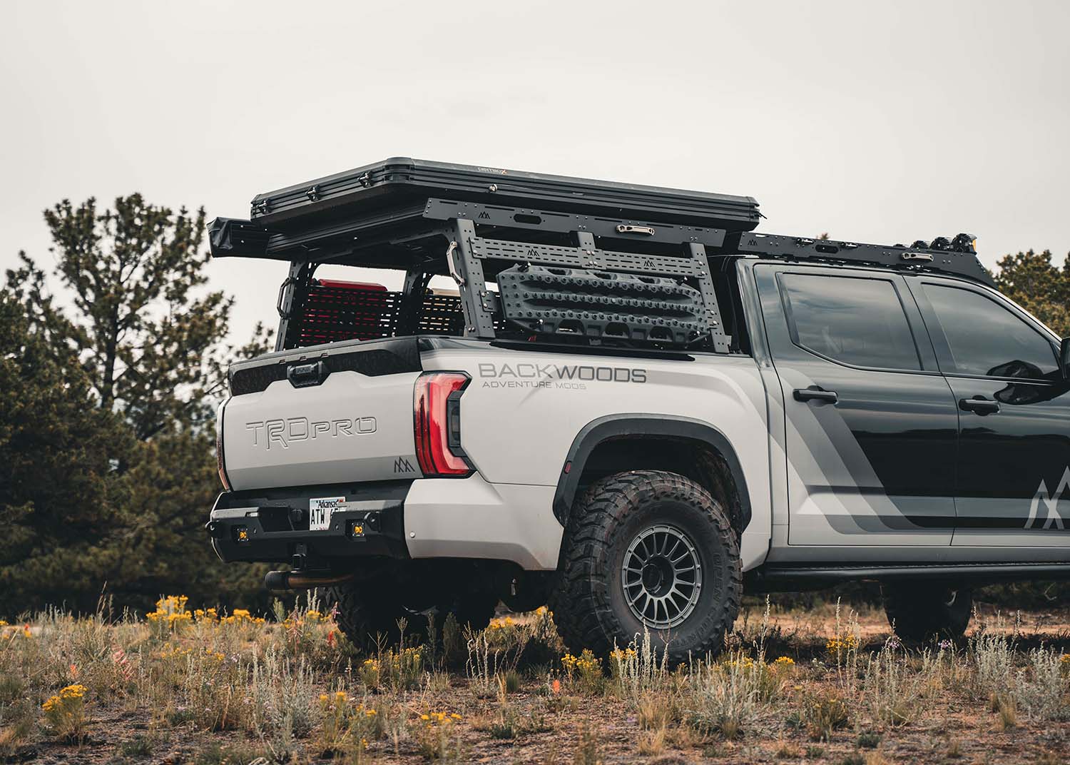 Bed Rack DRIFTR Topper cargo carrier on a Backwoods Adventure Mods  2022+ 3rd Gen Toyota Tundra bed rack with accessories installed