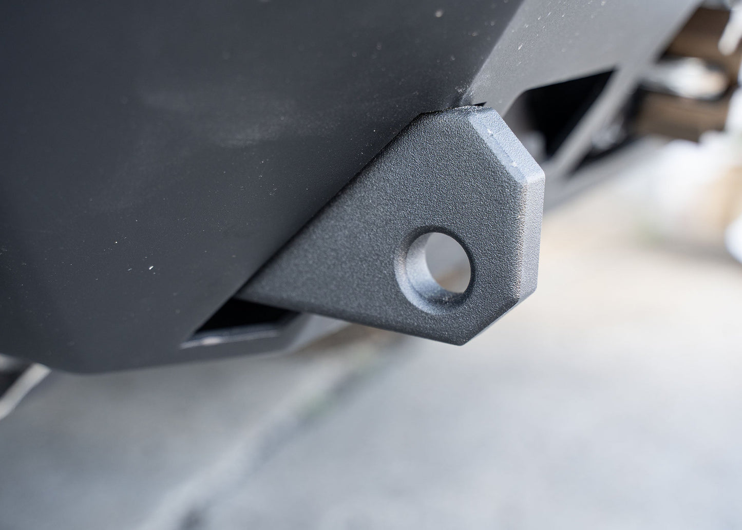 Close up of the off road recovery points on the Backwoods Adventure Mods 4th Gen 2024 Toyota Tacoma Front Bumper