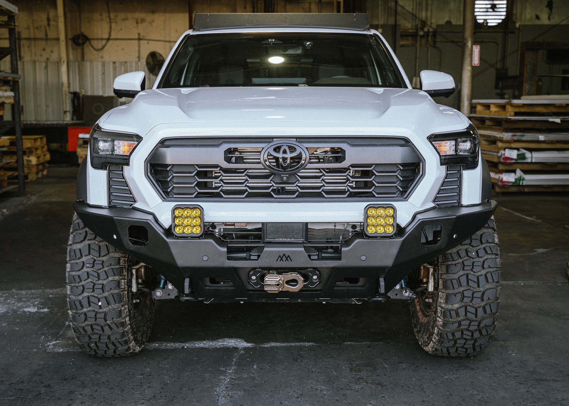 2024 4th Gen Toyota Tacoma with Backwoods Adventure Mods Hi-Lite Overland Front winch Bumper installed for high clearance off road