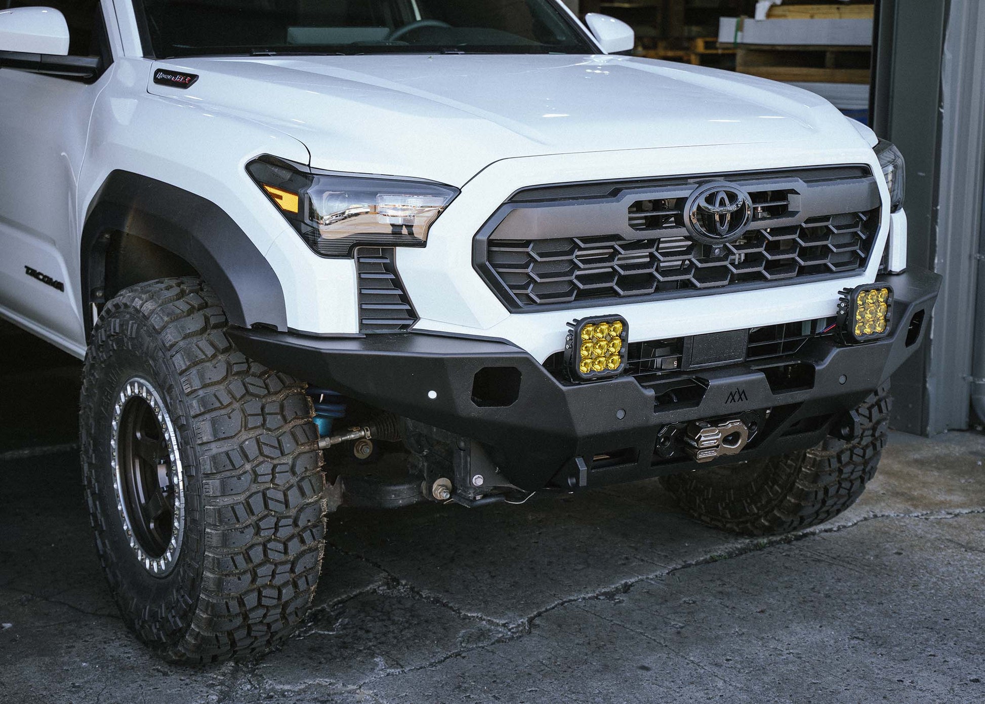 2024 Toyota Tacoma Hi-Lite hybrid aluminum Front Bumper by Backwoods Adventure Mods installed on a 4th gen Tacoma