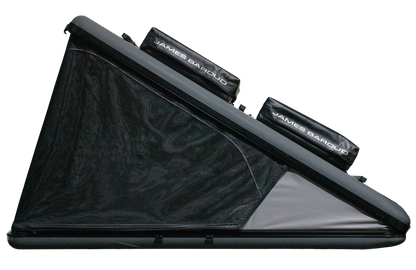 Roof top tent with cargo on top and closed windows