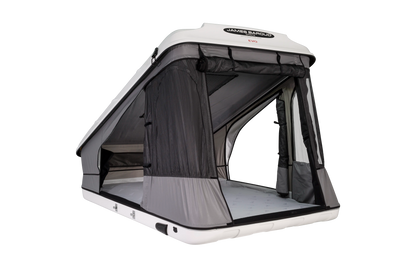 Clamshell Roof top tent with windows and doors open with view of the mattress