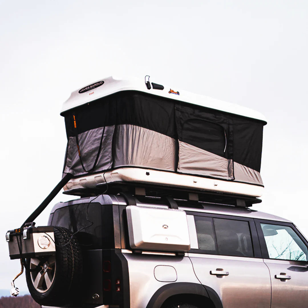 View of the pop up roof top tent on a land rover