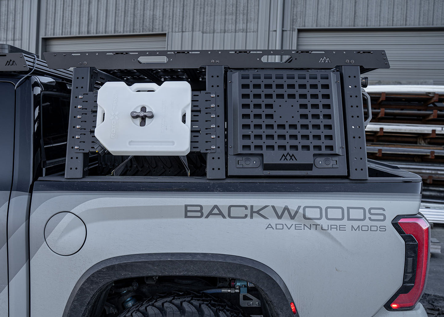 Toyota Tundra Aluminum Bed Rack locking cargo Storage Box installed as part of the Backwoods Adventure Mods modular overland bed rack cargo storage system 