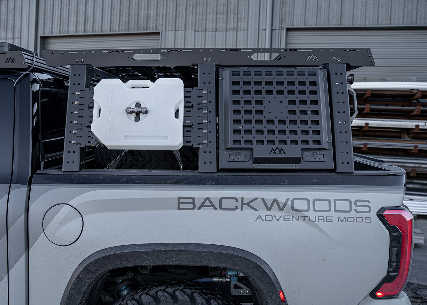 Toyota Tundra Aluminum Bed Rack locking cargo Storage Box installed as part of the Backwoods Adventure Mods modular overland bed rack cargo storage system 