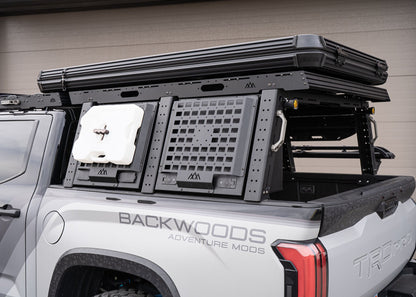 Backwoods Adventure Mods Toyota Tundra Aluminum Truck Bed Rack Storage Box closed with accessories mounted to the included molle panels